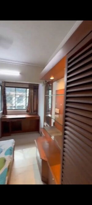 Living Room in 2 BHK Apartment at Andheri CHS, Andheri West – for Rent