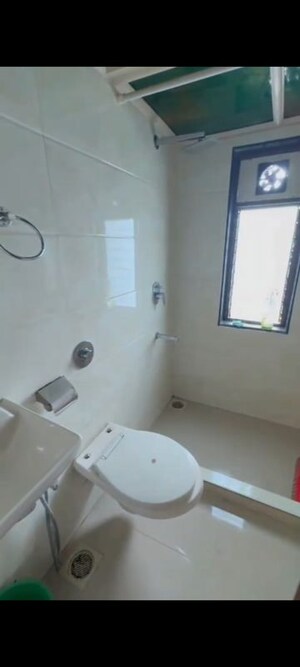 Bathroom in 2 BHK Apartment at Andheri CHS, Andheri West – for Rent