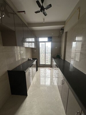 Kitchen in 3 BHK Apartment at Metro Millennium, Malad West – for Rent