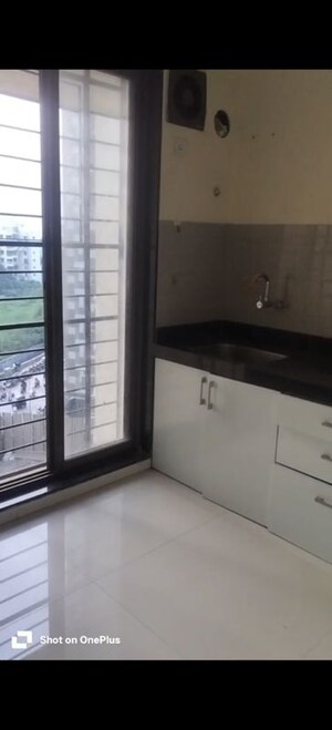 Kitchen in 2 BHK Apartment at Acme Avenue, Kandivali West – for Rent