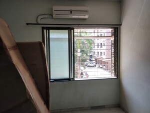 Building Lobby in 2 BHK Apartment at Prem Bhavini Enclave, Mulund East – for Rent