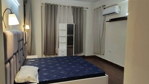 Bedroom in 3 BHK Apartment at Urban Axis Urban Woods, Sushant Golf City – for Rent