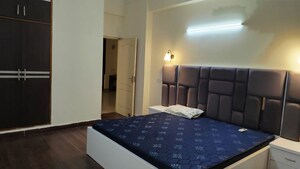 Bedroom in 3 BHK Apartment at Urban Axis Urban Woods, Sushant Golf City – for Rent