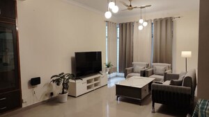 Living Room in 3 BHK Apartment at Urban Axis Urban Woods, Sushant Golf City – for Rent