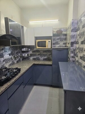 Kitchen in 3.5 BHK Apartment at Orris Carnation Residency, Sector 85 – for Sale