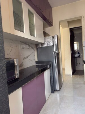 Kitchen in 1 BHK Apartment at VR Bhoomi Acres H wing, Waghbil – for Rent