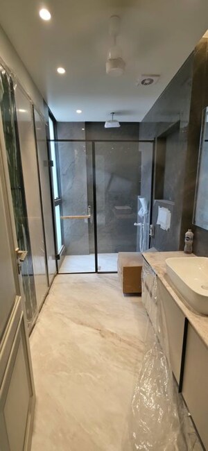 Bathroom in 4 BHK Builder Floor at Nehru Enclave – for Rent