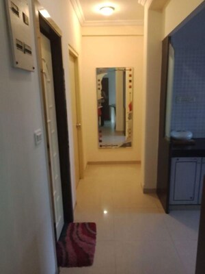 Building Lobby in 2 BHK Apartment at Express Apartment, Yari Road – for Rent