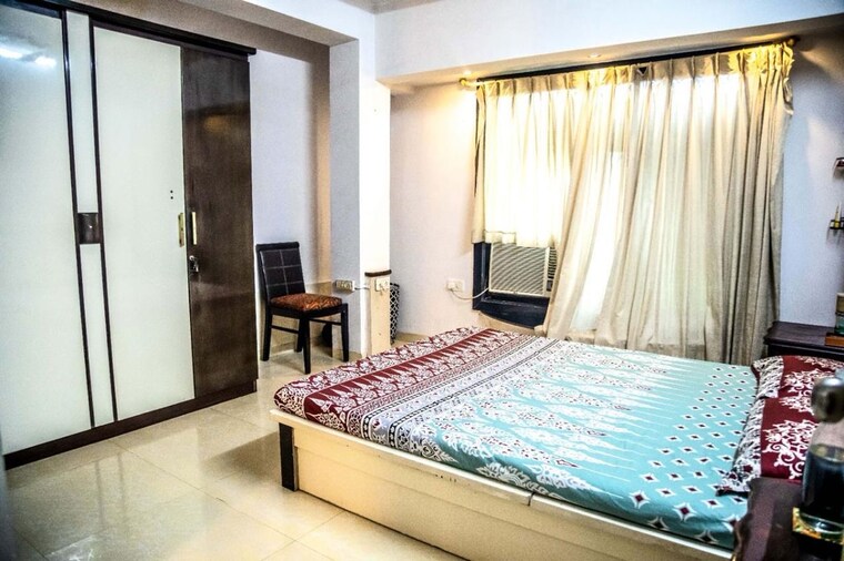 Bedroom, express-apartment 2 Bedroom 850 Sq.Ft. Apartment In Yari Road Mumbai 10754128