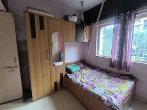 Bedroom in 2 BHK Apartment at Yash Sankul, Pimple Saudagar – for Rent