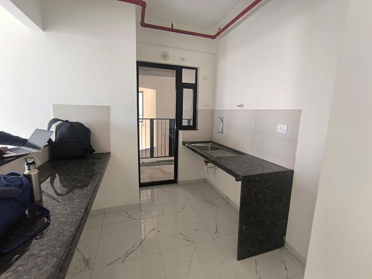 Kitchen, mahindra-nestalgia 2 Bedroom 731 Sq.Ft. Apartment In Pimpri Pune 10754324