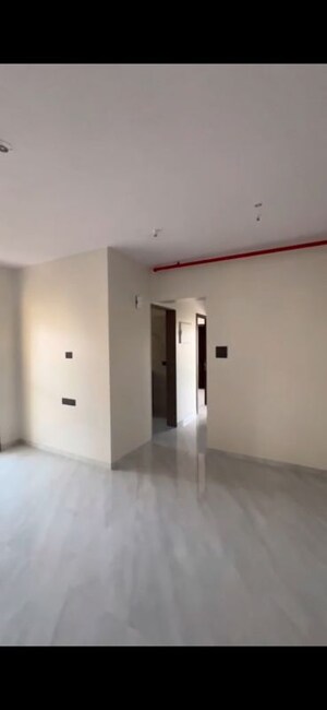 Room in 2 BHK Apartment at Kabra Garnet, Malad West – for Rent