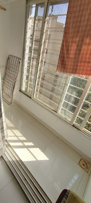 Balcony in 2 BHK Apartment at Ashish Triveni Apartments, Goregaon East – for Rent
