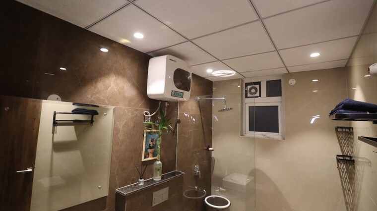 Washroom, maya-green-lotus-utsav 4 Bedroom 3130 Sq.Ft. Apartment In International Airport Road Zirakpur 10754422