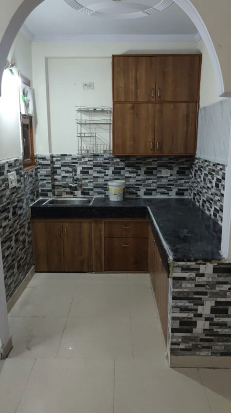 Kitchen, raj nagar 2 Bedroom 70 Sq.Yd. Builder Floor In Raj Nagar Delhi 10754384
