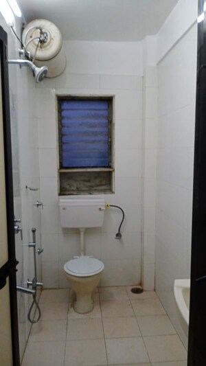 Bathroom in 1 BHK Apartment at Altamount Road – for Rent
