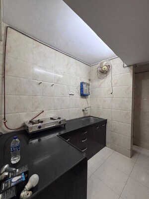 Kitchen in 2 BHK Apartment at Sai Krishna Kunj, Andheri West – for Rent