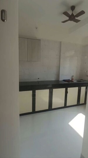 Kitchen in 1 BHK Apartment at Horizon Height, Kasarvadavali – for Rent