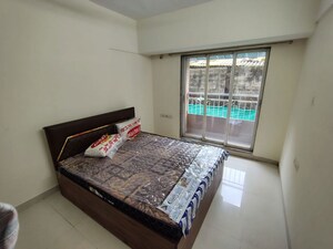 Bedroom in 2 BHK Apartment at Atul Blue Meadows, Andheri East – for Sale