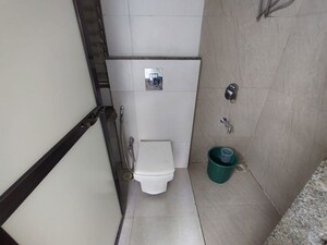 Bathroom in 2 BHK Apartment at Atul Blue Meadows, Andheri East – for Sale