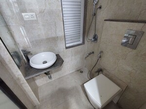 Bathroom in 2 BHK Apartment at Atul Blue Meadows, Andheri East – for Sale