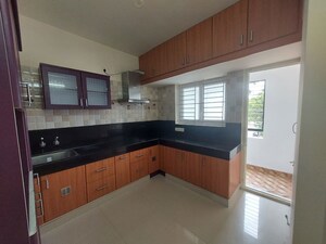 Kitchen in 2 BHK Apartment at Sharda Green Wood, Kasarvadavali – for Rent