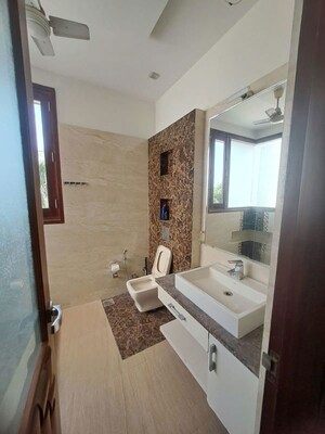 Bathroom in 4 BHK Builder Floor at Sector 91 – for Rent