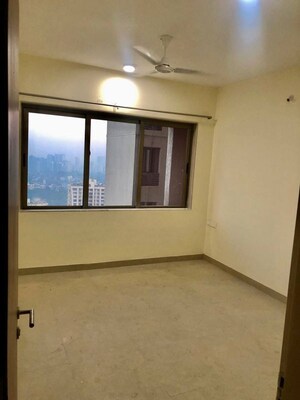 Room in 2.5 BHK Apartment at T Bhimjyani Neelkanth Woods, Manpada – for Sale