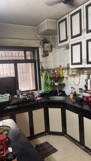Kitchen in 2 BHK Apartment at Chamunda Heritage, Andheri East – for Rent