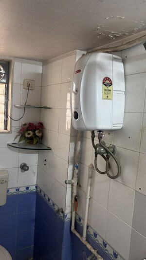 Bathroom in 2 BHK Apartment at Chamunda Heritage, Andheri East – for Rent