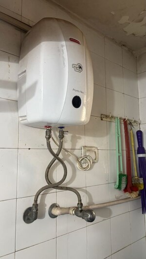 Bathroom in 2 BHK Apartment at Chamunda Heritage, Andheri East – for Rent