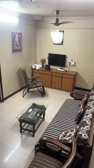Living Room in 2 BHK Apartment at Chamunda Heritage, Andheri East – for Rent