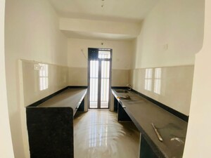 Kitchen in 2 BHK Apartment at Runwal My City, Manpada – for Rent
