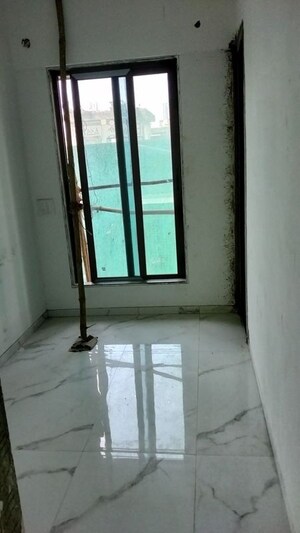 Room in 2 BHK Apartment at Nine Reflex, Dadar East – for Sale