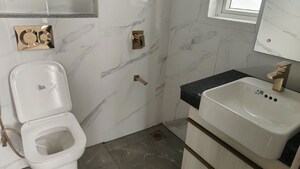 Bathroom in 3 BHK Apartment at Smart World Orchard, Sector 61 – for Rent