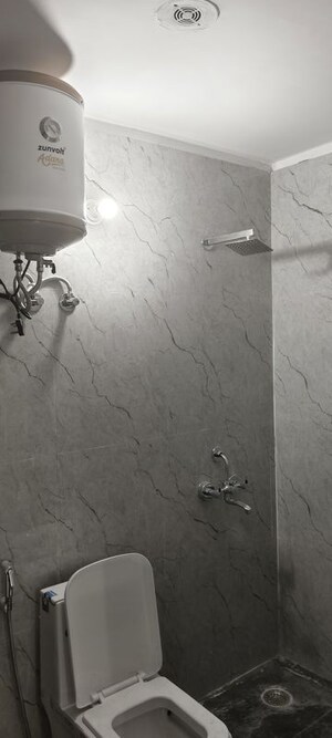 Bathroom in 1 BHK Builder Floor at Dharam Colony – for Rent