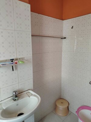 Bathroom in 3 BHK Apartment at Birubari – for Sale