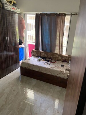 Bedroom in 2 BHK Apartment at Platinum Corporation, Andheri West – for Sale