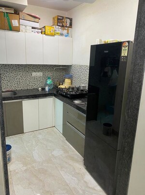 Kitchen in 2 BHK Apartment at Platinum Corporation, Andheri West – for Sale
