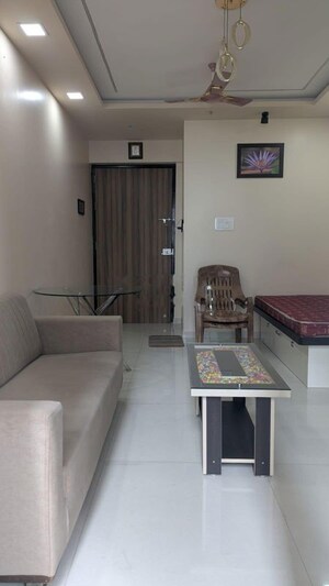 Living Room in 1 BHK Apartment at Lodha Splendora, Ghodbunder Road – for Rent