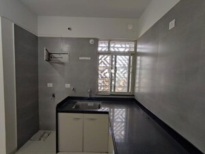 Kitchen in 2 BHK Apartment at Kohinoor Coral Phase 3, Hinjewadi – for Rent