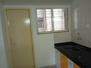 Kitchen in 2 BHK Apartment at Kumar Girija Shankar Vihar, Karve Nagar – for Rent