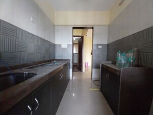 Kitchen in 2 BHK Apartment at Tharwani Riviera, Kharghar – for Rent