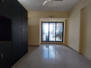 Room in 2 BHK Apartment at Tharwani Riviera, Kharghar – for Rent