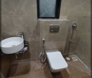 Bathroom in 1 BHK Apartment at Damji Shamji Mahavir Spring Tulip Phase 1, Pokhran Road No Two – for Sale