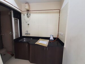 Bathroom in 1 BHK Apartment at Spring Grove Uno Society, Kandivali East – for Rent