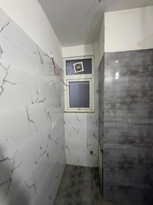 Bathroom in 2 BHK Apartment at Umang Winter Hills, Sector 77 – for Rent