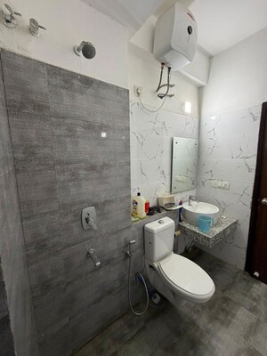 Bathroom in 2 BHK Apartment at Umang Winter Hills, Sector 77 – for Rent