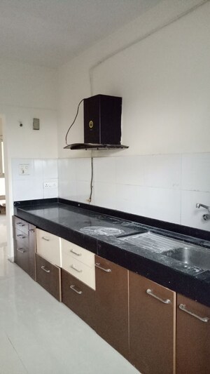 Kitchen in 2 BHK Apartment at Mind Space Queenstown, Chinchwad – for Rent
