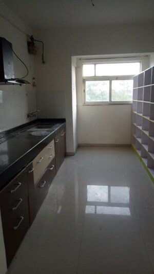 Kitchen in 2 BHK Apartment at Mind Space Queenstown, Chinchwad – for Rent